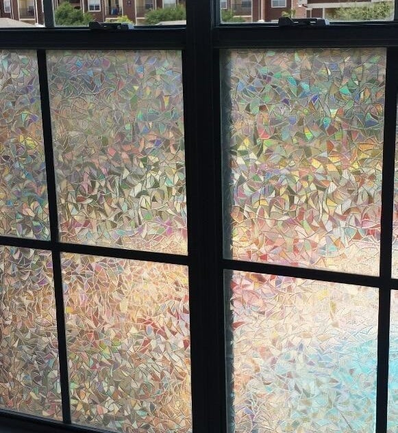 reviewer&#x27;s window with holographic geometric frosted covering