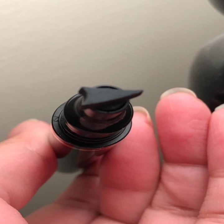 The eyeliner stamp, which looks like a regular eyeliner pen, except the tip is in the shape of a cat eye wing