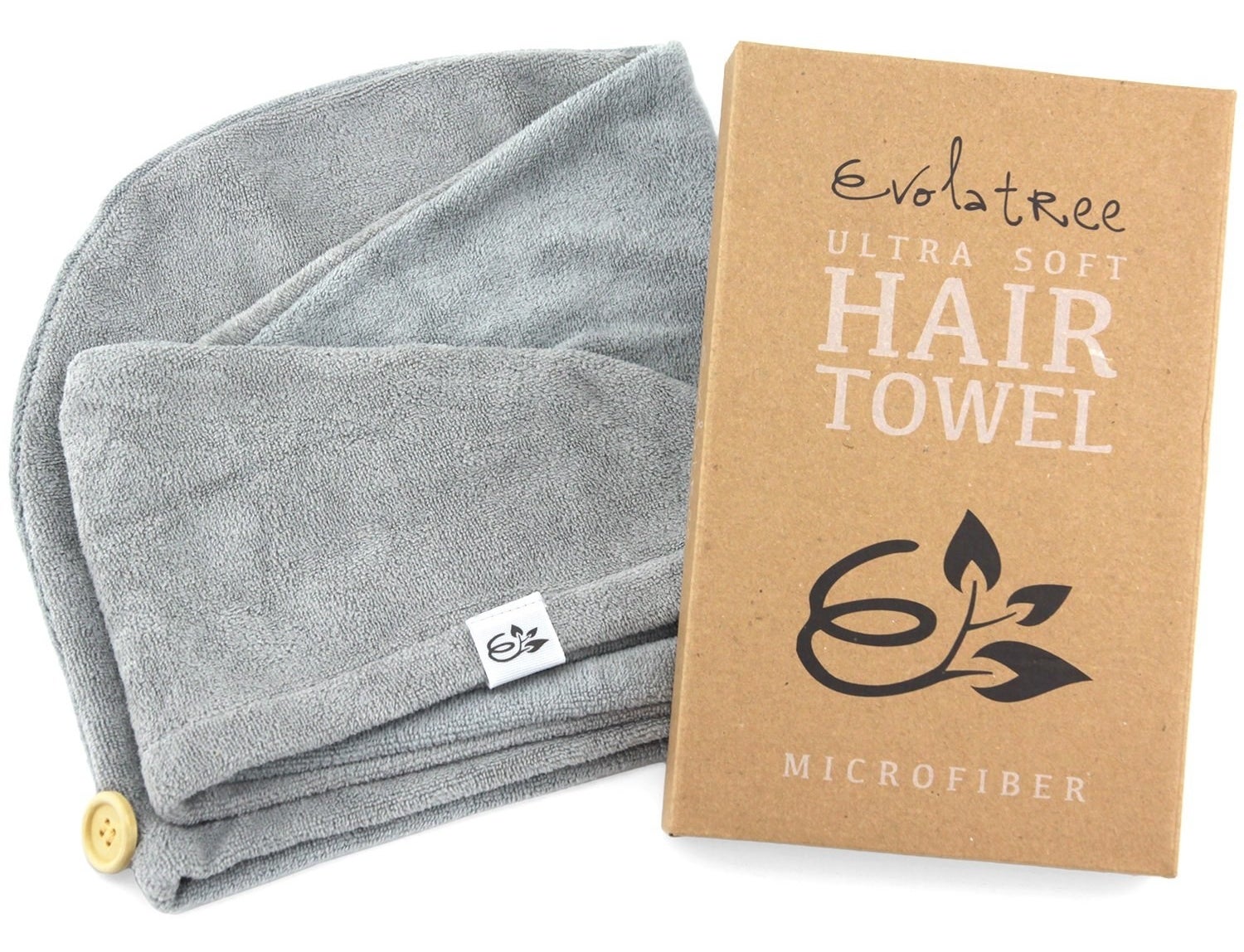 The microfibre hair towel next to its package