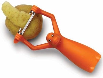 the front side of the orange peeler that looks like a monkey with its arms up