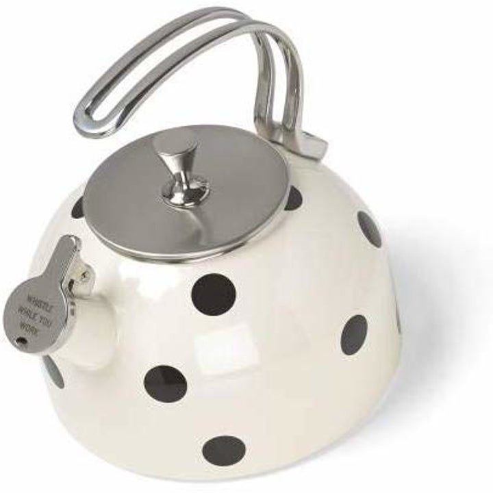 the kettle in white with black polka dots