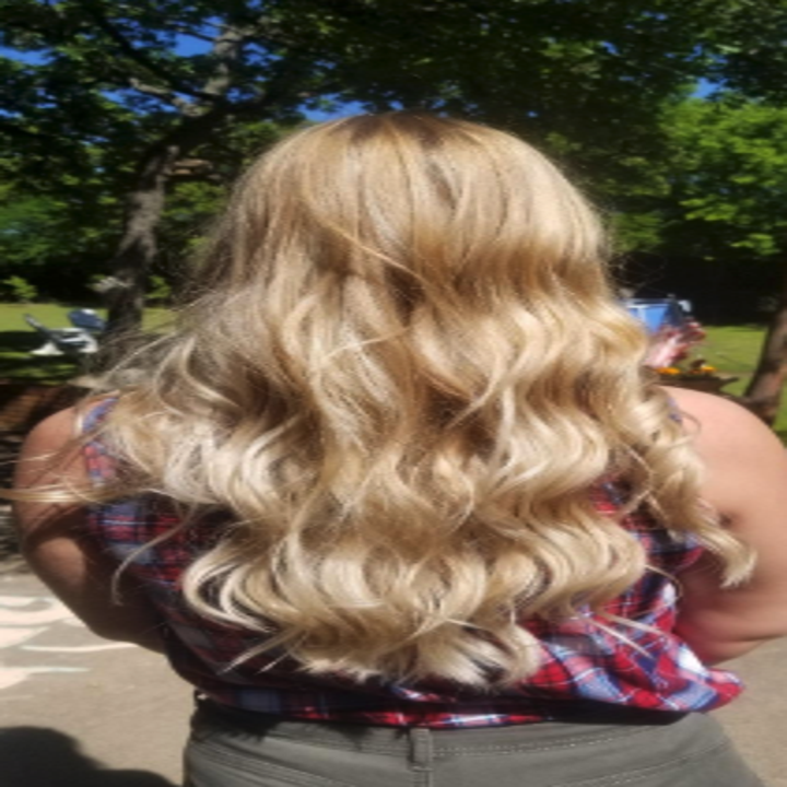 a reviewer's long flowing wavy hair