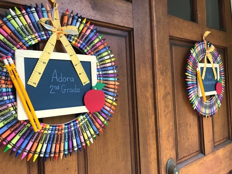 crayon wreath with customized chalkboard, two pencils and a wooden apple glued to the chalkboard