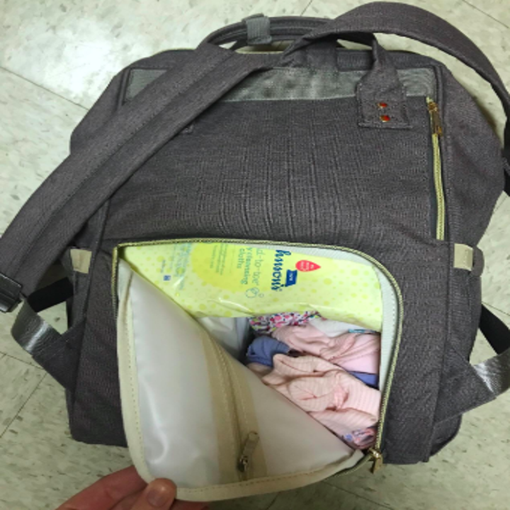 reviewer pic of storage in the diaper bag