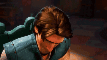 a gif of flynn rider from tangled giving a seductive stare