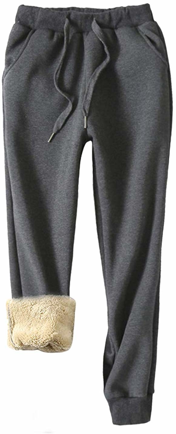 The grey drawstring-waist pants, cuffed to show the lining
