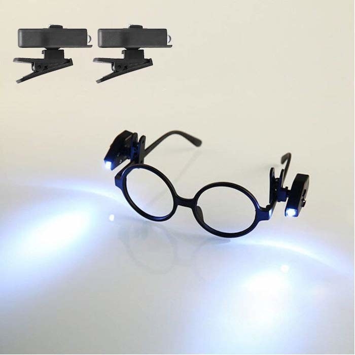 black glasses with one clip on each side