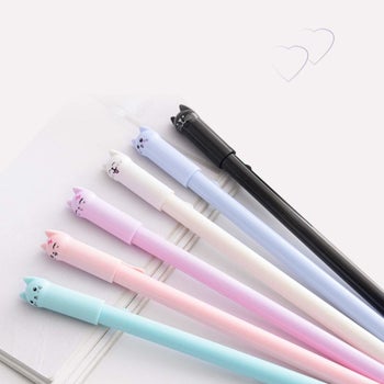 the pens with cat ears and faces on the caps in mint, peach, lilac, white, blue, and black