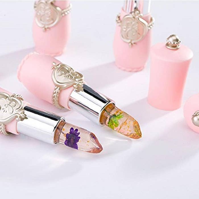 The lipsticks with different flowers inside. 