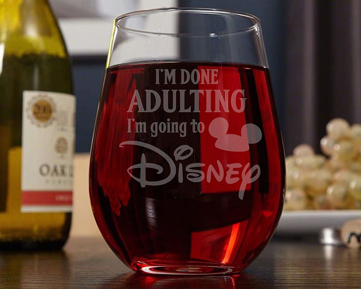 a wine glass that says 