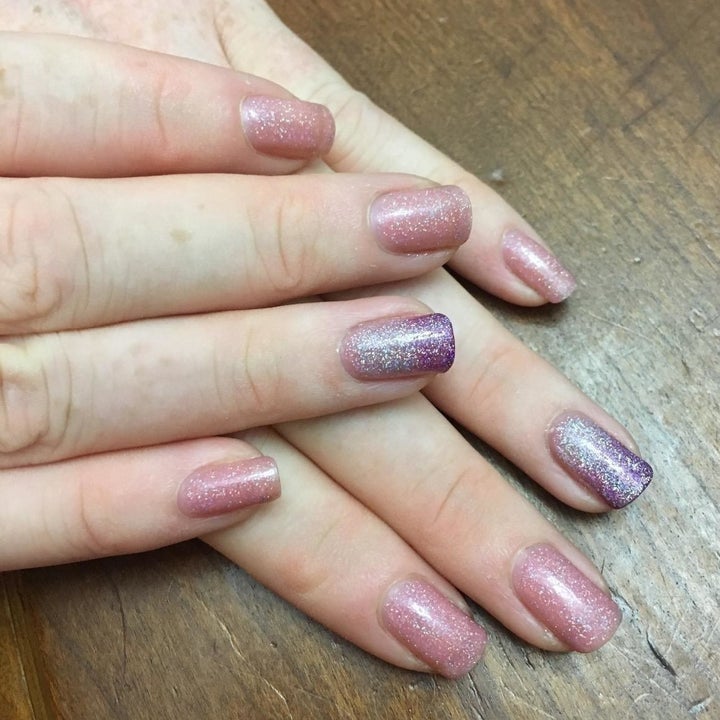Amazon reviewer shows of a fresh manicure after using peel-off polish barrier