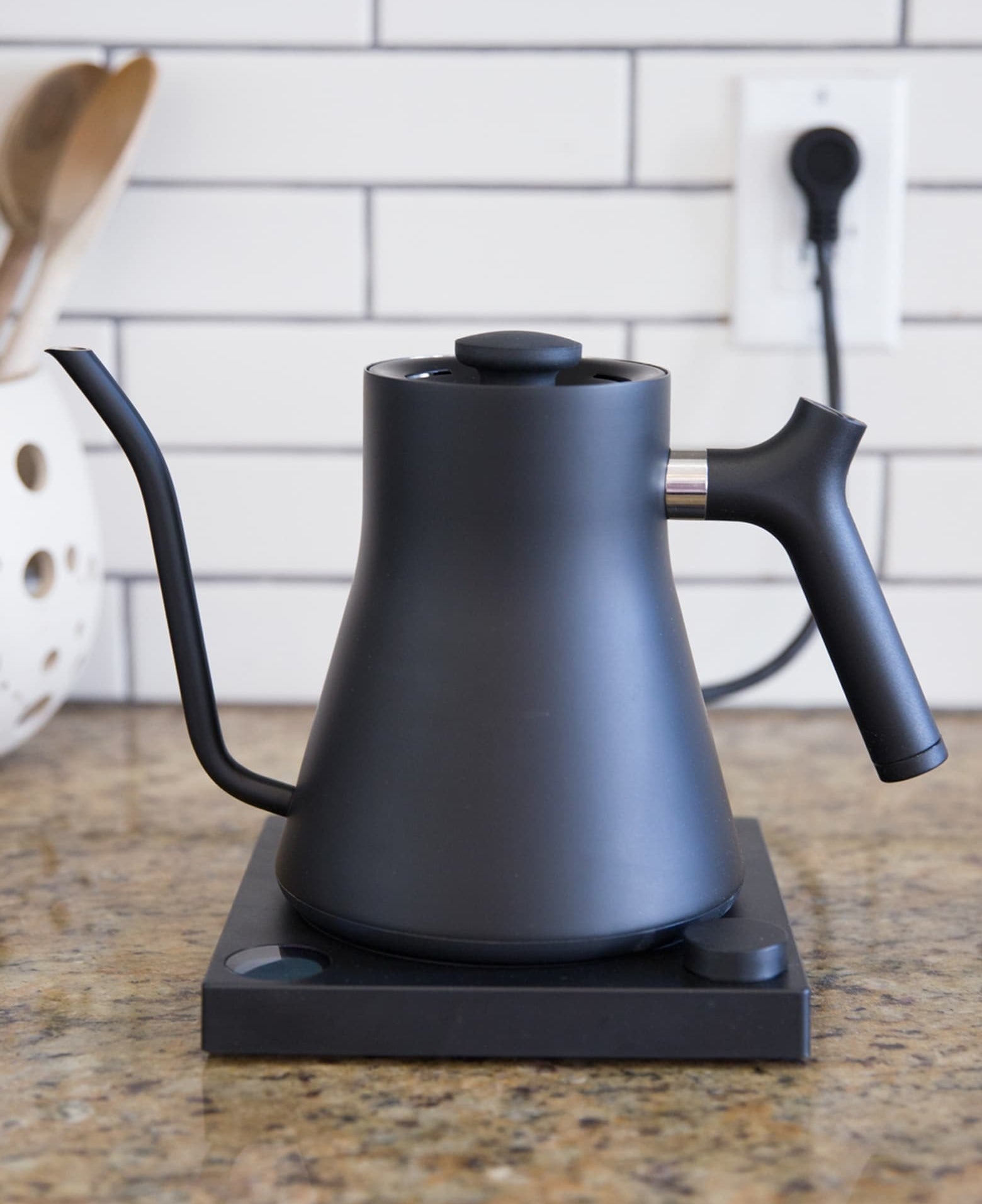 The black matte kettle with matching base