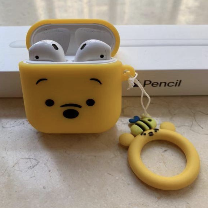 a reviewer's airpods in the case