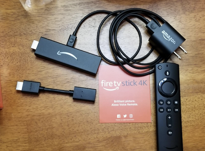 the fire stick that looks like a jump drive, the wire that goes with it, and the remote that operates it