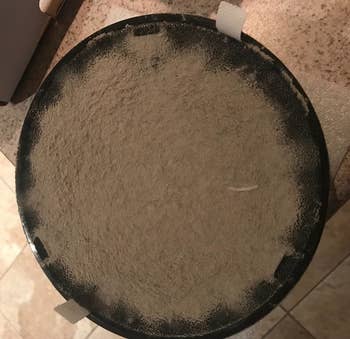 Reviewer photo of the filter showing how much dust it picked up