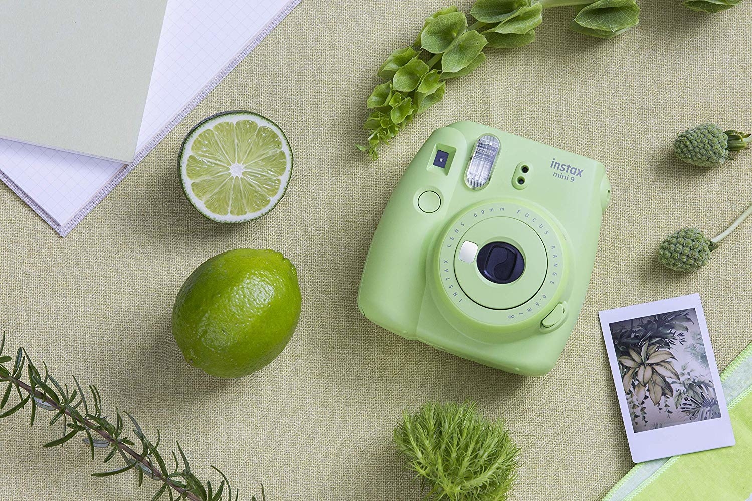 The light green camera and the rectangular photo it prints out