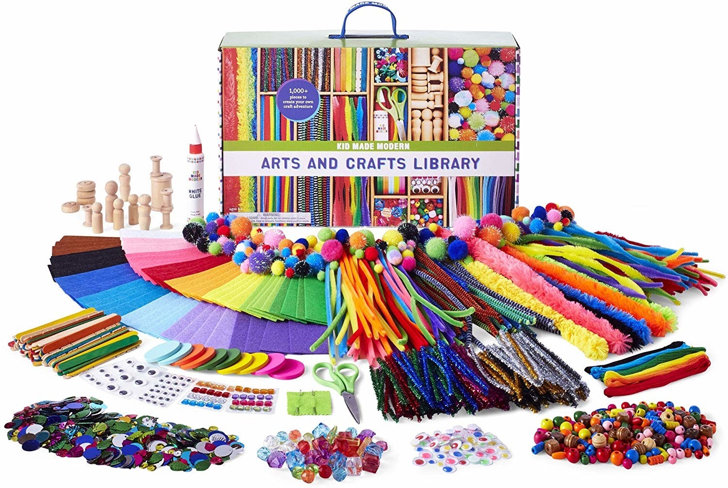 the contents of the arts and crafts library laid out in fronts of its box