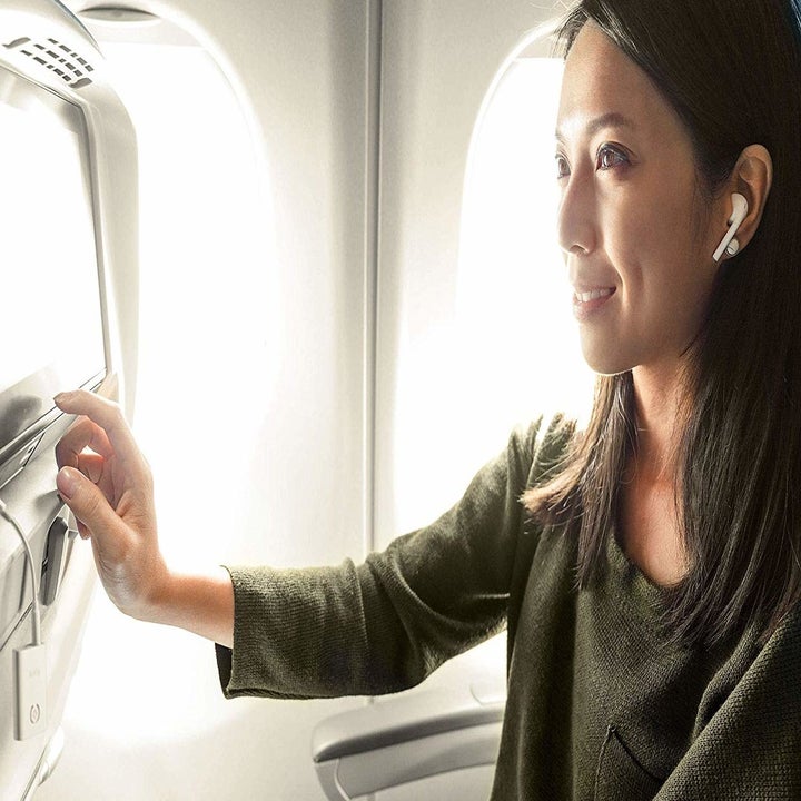 Person using product on airplane 