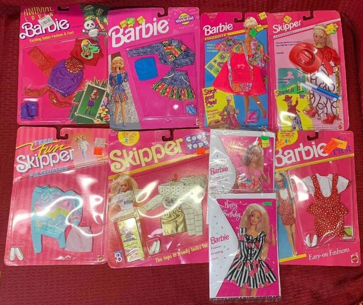 A set of 9 various different Barbie clothes