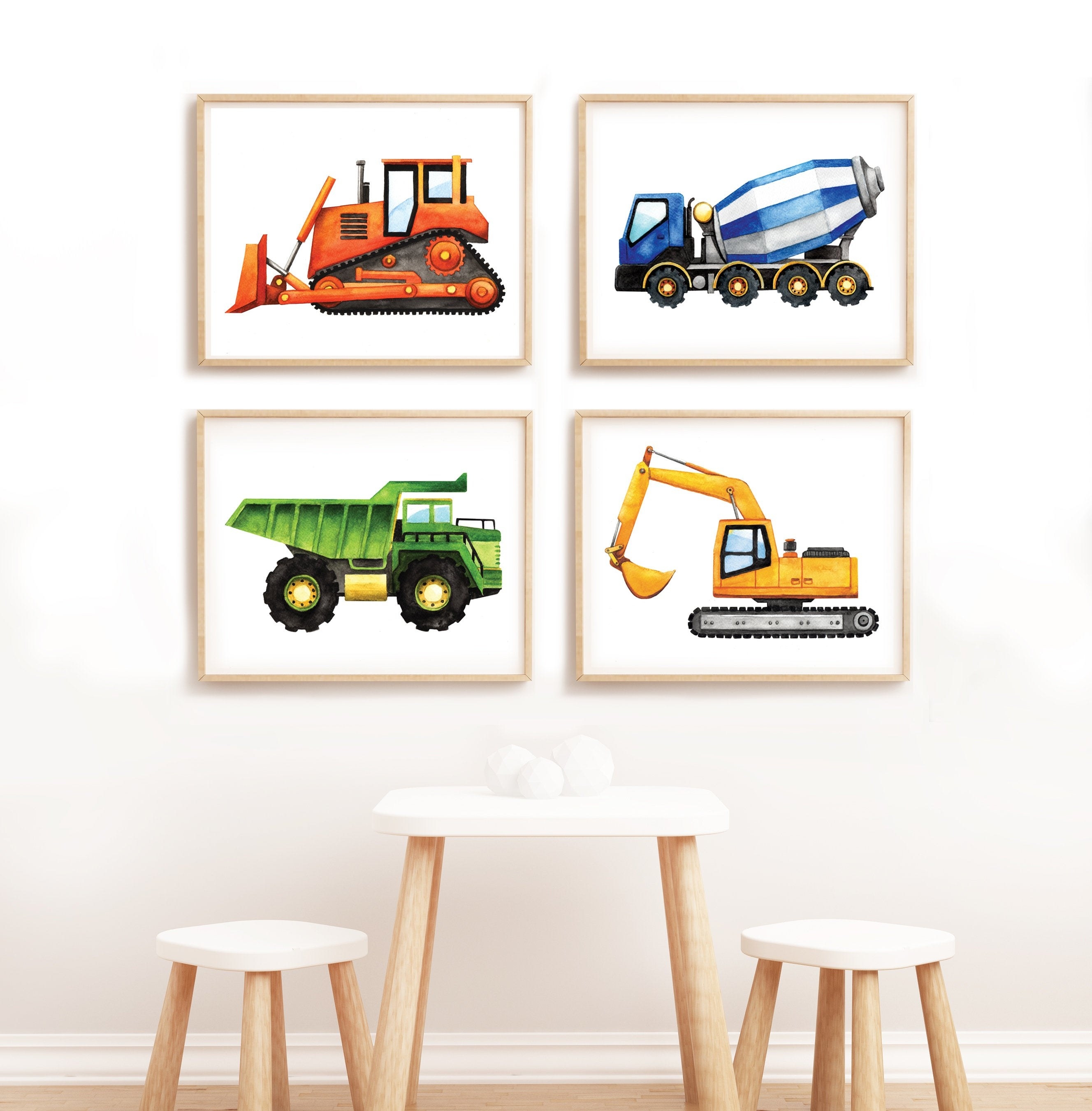 four framed construction vehicle prints