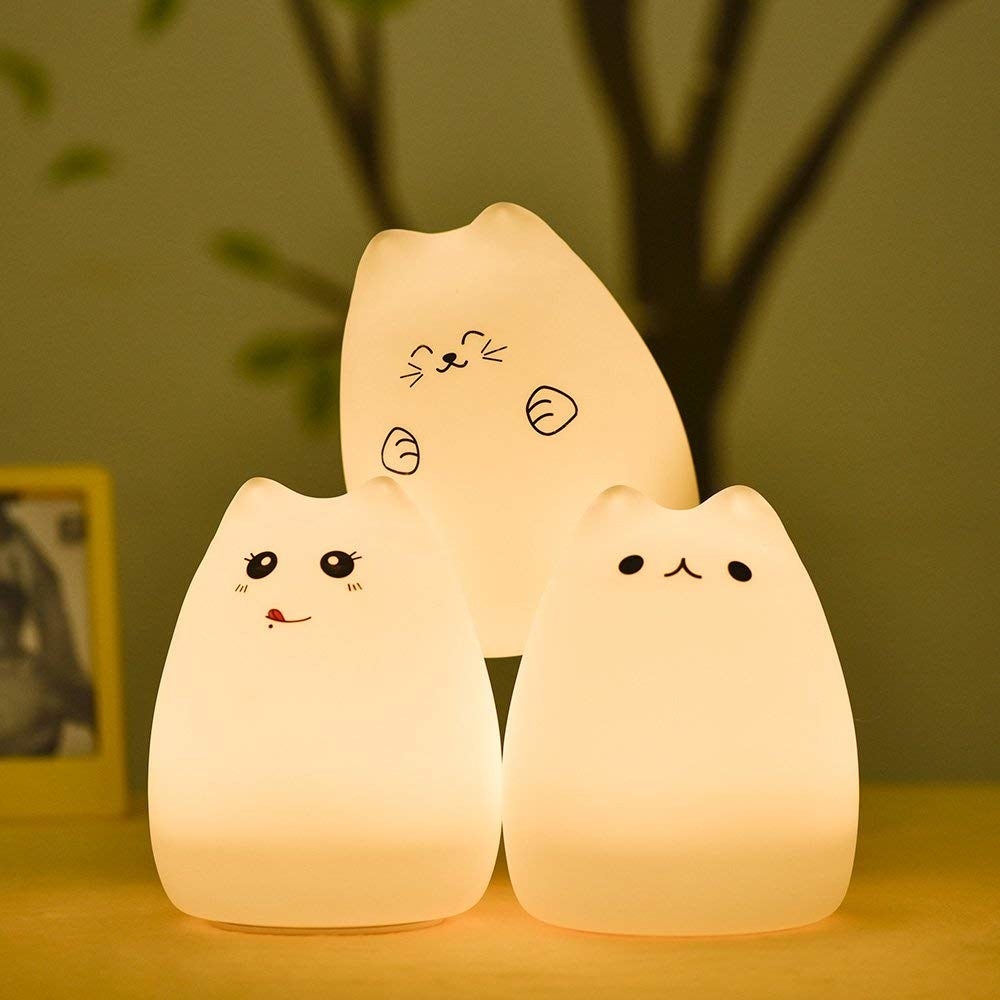 The kitty nightlights stacked on top of each other
