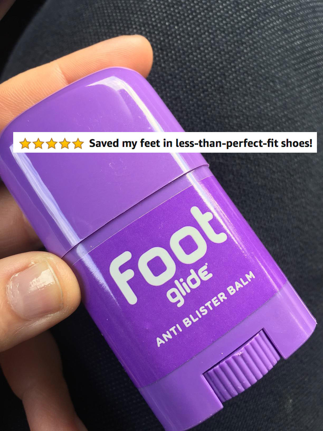 The deodorant-like roll-up stick, with five stars and review text &quot;saved my feet in less-than-perfect-fit shoes&quot;