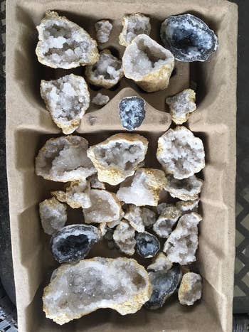 reviewer's tray filled with sparkly geodes