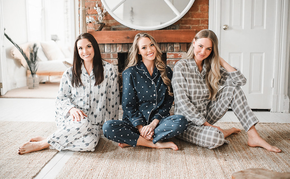 Three people wearing the flannel pajamas