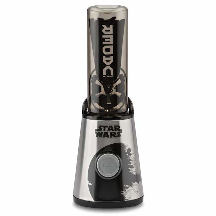 the blender with the star wars emblem on the base and the cup at the top that says