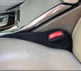 another reviewer showing another angle of the car seat gap filler