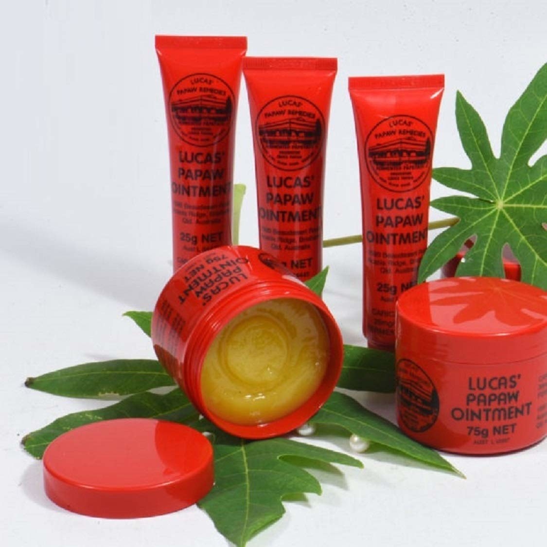red tubes of yellow lip balm