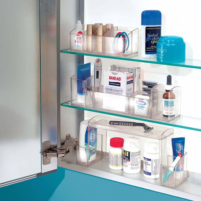 open medicine cabinet with organizers inside