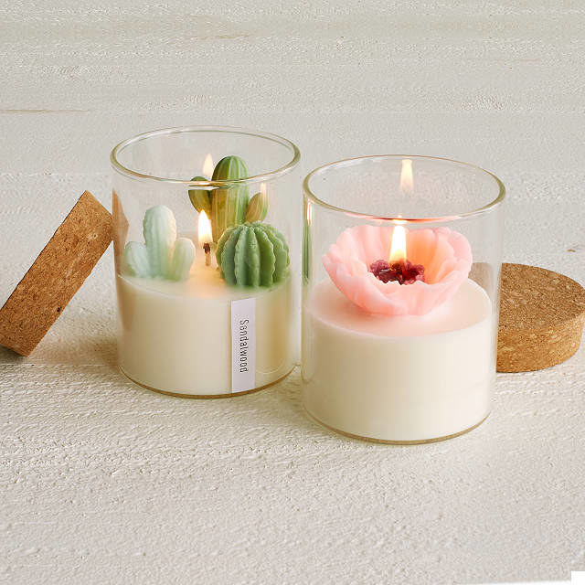 Two candles with terrarium wax design 
