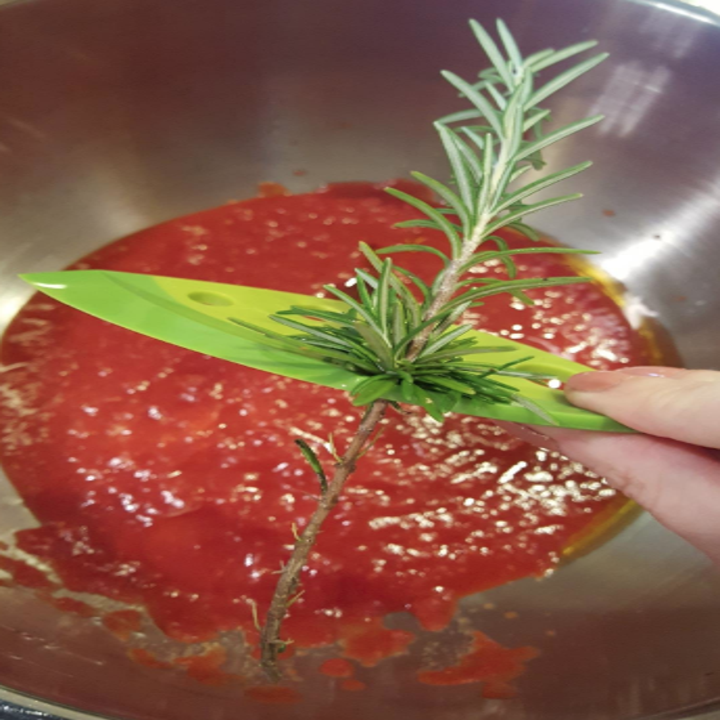 reviewer using it to pull rosemary off into pot of pasta sauce

