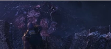 Thanos throwing Gamora over the cliff