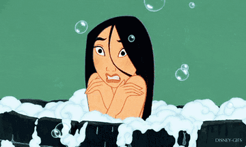 a gif of mulan shivering in the bath tub