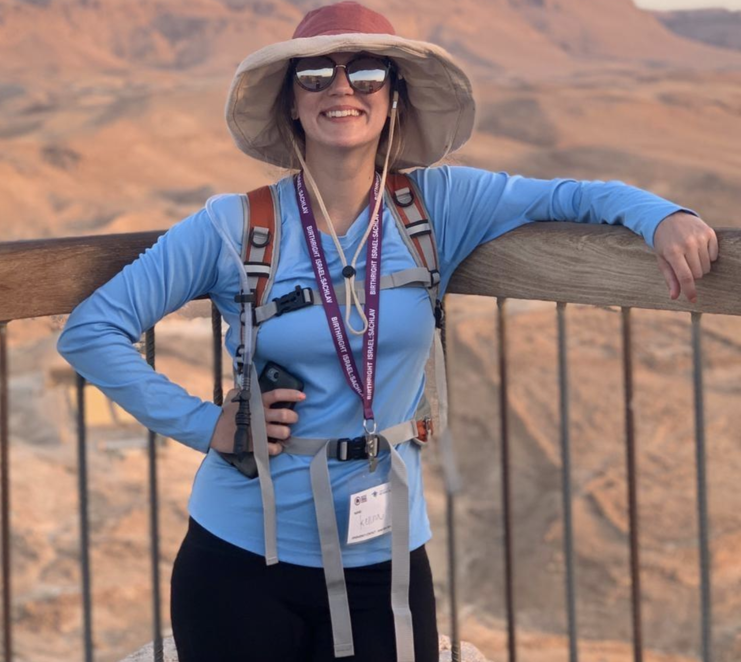 Reviewer wearing the long-sleeved shirt in light blue while hiking