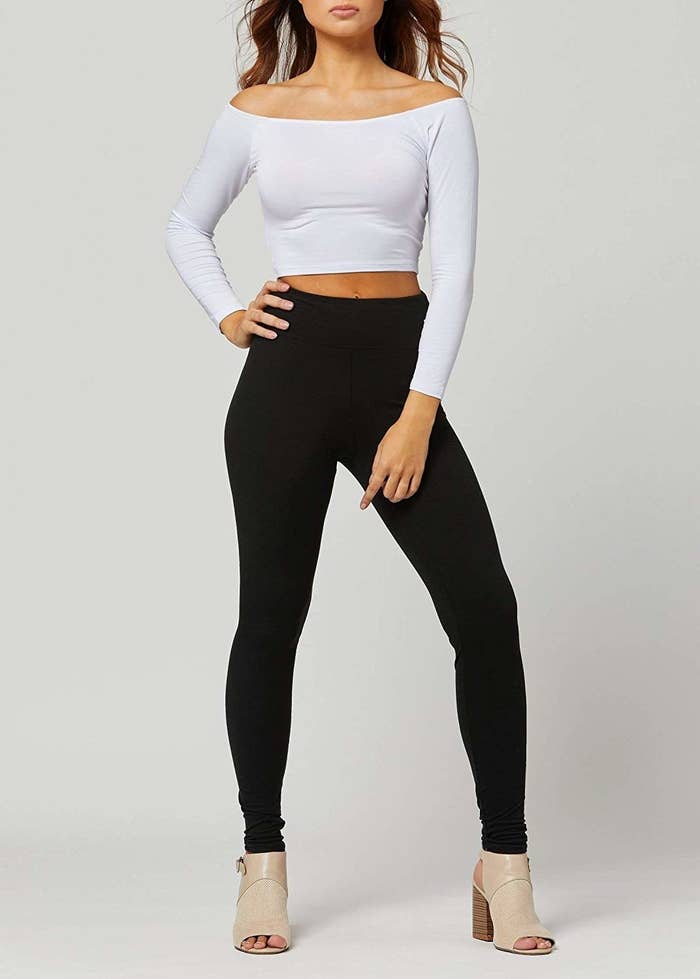 a model wearing the black full-length leggings