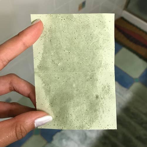 Reviewer photo of used oil blotting sheet