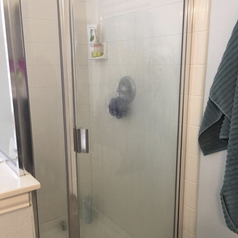 reviewer photo of dirty shower door