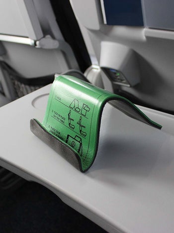 curved holder on plane table tray