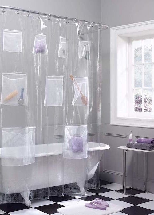 the curtains hanging up with the mesh pockets facing outside of the shower