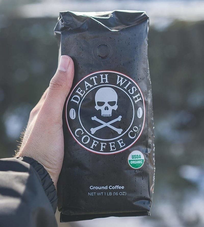 bag of the ground coffee with a skull and crossbones on the front