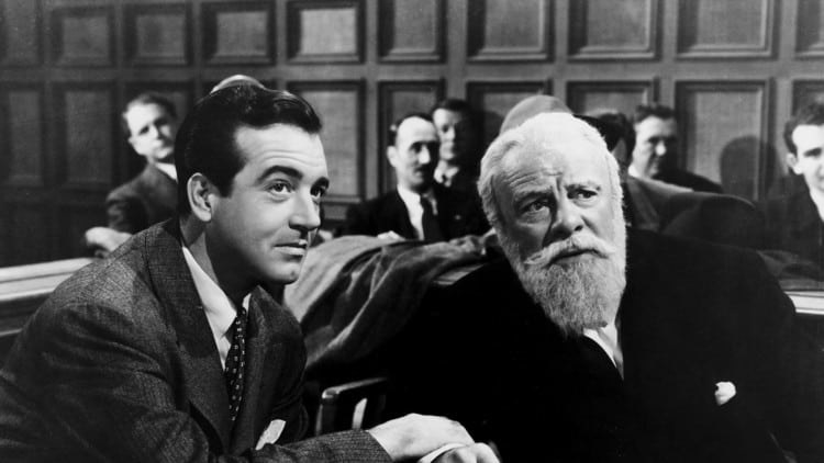 a black and white court scene with santa and his lawyer in miracle on 34th street