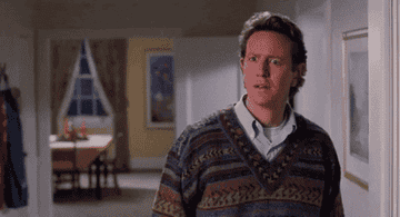 gif of judge reinhold looking confused in the santa clause