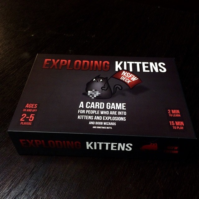 A box of the exploding kittens card game