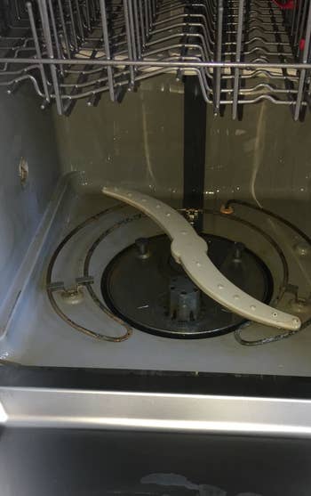 The same dishwasher, which is now stain-free after using the tablets