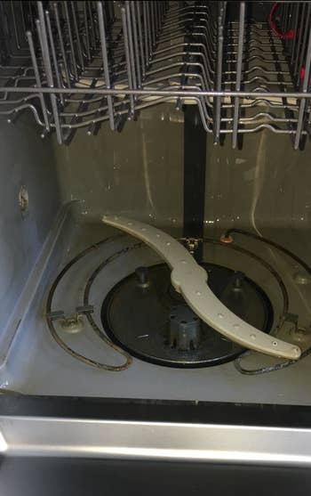 The same dishwasher, which is now stain-free after using the tablets