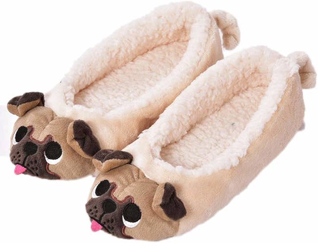 The low slippers with pug faces at the front with little tongues sticking out