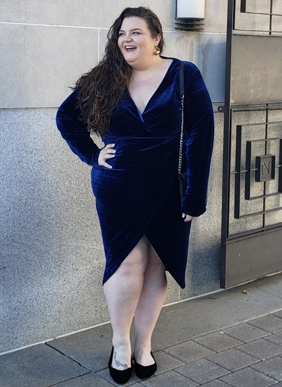 reviewer wearing the blue velvet dress 